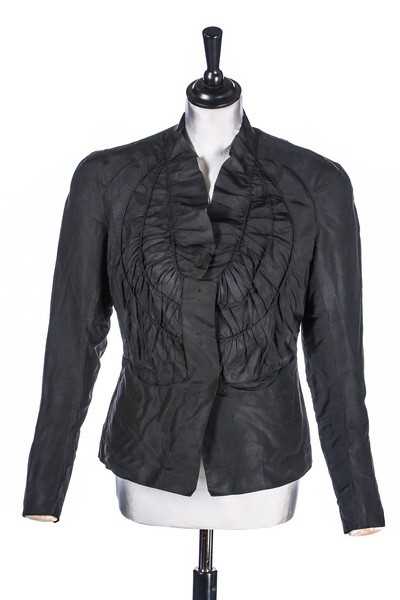 Lot 68 - A Schiaparelli couture black faille evening...