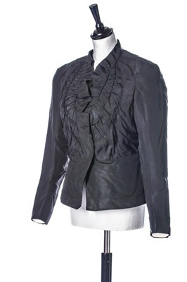 Lot 68 - A Schiaparelli couture black faille evening...
