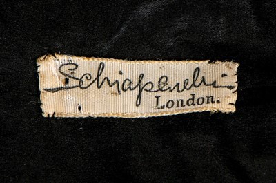 Lot 68 - A Schiaparelli couture black faille evening...