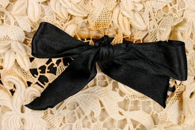 Lot 77 - A Balenciaga couture ivory guipure cocktail...