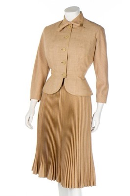 Lot 82 - A Pierre Balmain couture oatmeal linen suit,...