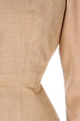Lot 82 - A Pierre Balmain couture oatmeal linen suit,...