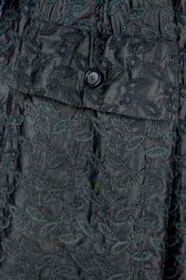 Lot 85 - A Jacques Fath embroidered black satin tent coat, 1954