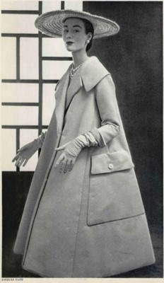 Lot 85 - A Jacques Fath embroidered black satin tent coat, 1954