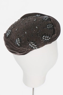 Lot 88 - Two Christian Dior hats, mid 1950s, both...