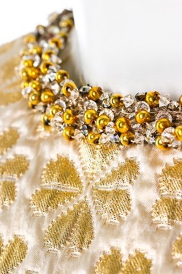 Lot 111 - A good Yves Saint Laurent brocatelle lamé mini...