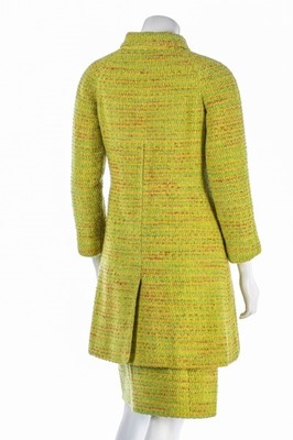 Lot 95 - A Chanel couture chartreuse tweed suit, 1968,...