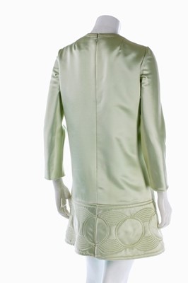 Lot 108 - A Pierre Cardin quilted aqua satin mini-dress,...