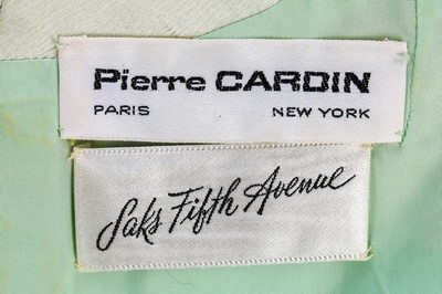 Lot 108 - A Pierre Cardin quilted aqua satin mini-dress,...