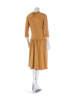 Lot 99 - A Madame Grs couture flecked tan jersey day...