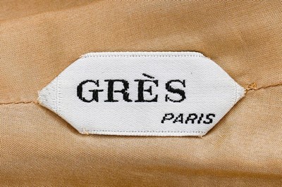 Lot 99 - A Madame Grs couture flecked tan jersey day...