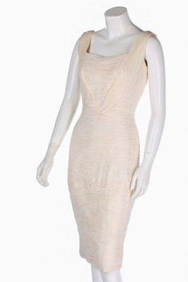 Lot 102 - A ruched white jersey cocktail dress in the...