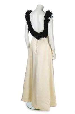 Lot 102 - A ruched white jersey cocktail dress in the...