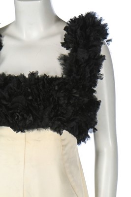 Lot 102 - A ruched white jersey cocktail dress in the...
