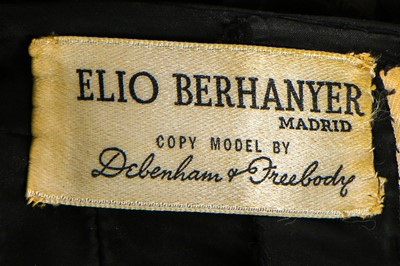 Lot 102 - A ruched white jersey cocktail dress in the...