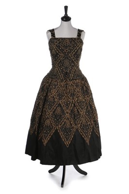 Lot 35 - A Dior London embellished black faille...