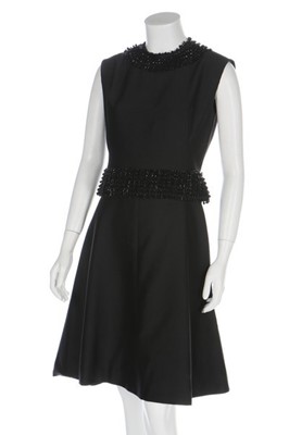 Lot 56 - Seven cocktail dresses in mainly ivory and...