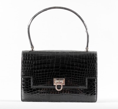 Lot 91 - A Gucci black crocodile handbag, late 1960s,...