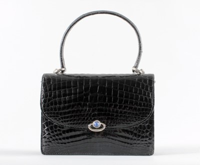 Lot 92 - A Gucci black crocodile handbag, late 1960s,...