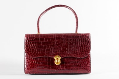 Lot 219 - An Hermès wine crocodile 'Escale' bag, late...