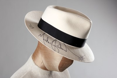 Lot 59 - Michael Jackson's white felt Fedora, signed to...