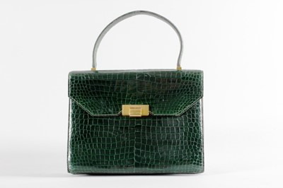 Lot 6 - An Hermès dark green crocodile 'Pascal' bag,...