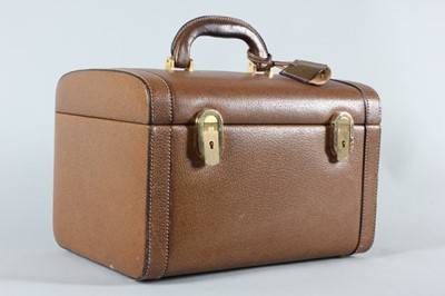 Lot 10 - A Gucci pig-skin vanity case, circa 1970, with...