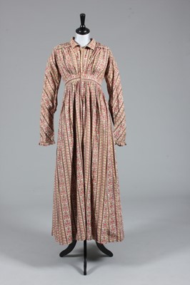 Lot 84 - A block printed cotton day dress, 1820s, front...