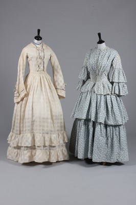 Lot 63 - A printed cotton day dress, circa 1855, with...