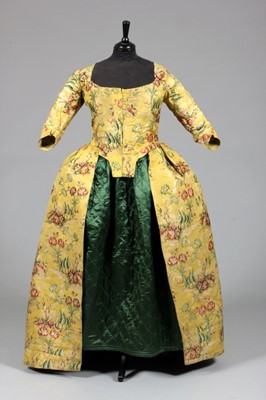 Lot 80 - A brocaded silk robe l'Anglaise, the silk...