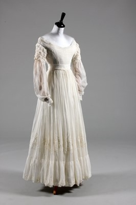 Lot 86 - A whitework embroidered gown, 1830s, with...