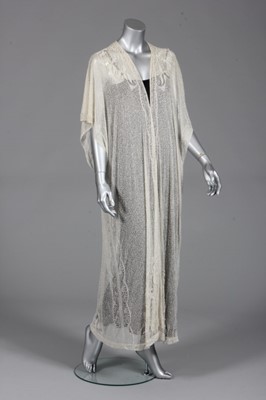 Lot 92 - A fine beaded evening coat, early 1920s, of...