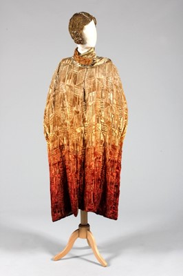 Lot 94 - A cut velvet opera cape and a gold cord wig,...
