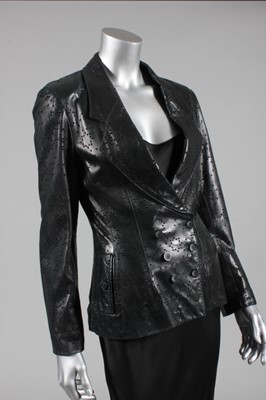 Lot 200 - An Azzedine Alaia black perforated leather...