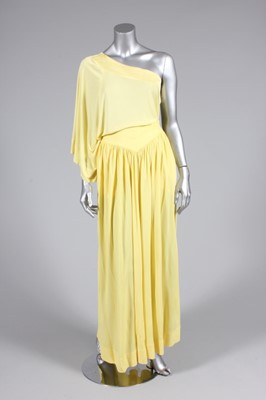 Lot 10 - A Yuki primrose polyester jersey evening...
