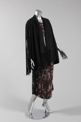 Lot 122 - A beaded chiffon cocktail dress, early 1920s,...