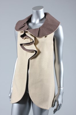 Lot 18 - A Yuki beige and brown wool waistcoat,...