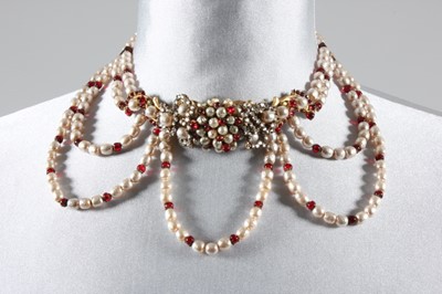 Lot 64 - A Miriam Haskell pearl and garnet bead choker,...