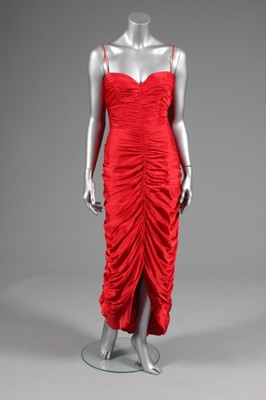 Lot 115 - A Loris Azzaro draped scarlet satin evening...