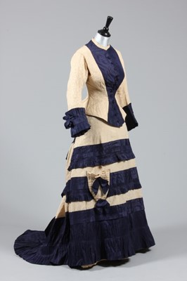 Lot 29 - A midnight-blue taffeta and ivory figured silk...