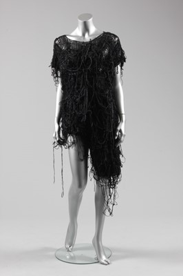 Lot 123 - A Comme des Garçons black tousled knit tunic,...