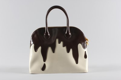 Lot 12 - A Moschino 'Fudge the Fashionistas, Let them...