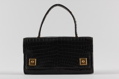 Lot 8 - An Hermès black crocodile `Piano' handbag,...