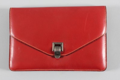 Lot 14 - An Hermès red leather clutch bag, 1930s, the...