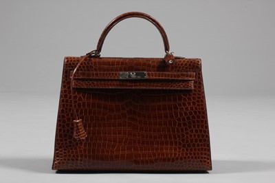 Lot 6 - A fine Hermès brown crocodile Kelly bag, 2006,...