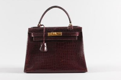 Lot 5 - An Hermès wine crocodile Kelly bag, circa 1964,...