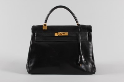 Lot 1 - An Hermès black leather Kelly bag, 1991, blind...