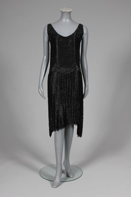 Lot 40 - A fine couture beaded cocktail gown, mid 1920s,...