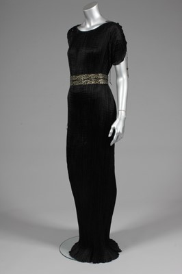 Lot 38 - A Mariano Fortuny black silk Delphos, circa...