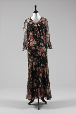 Lot 47 - A Jean Patou couture printed chiffon garden...